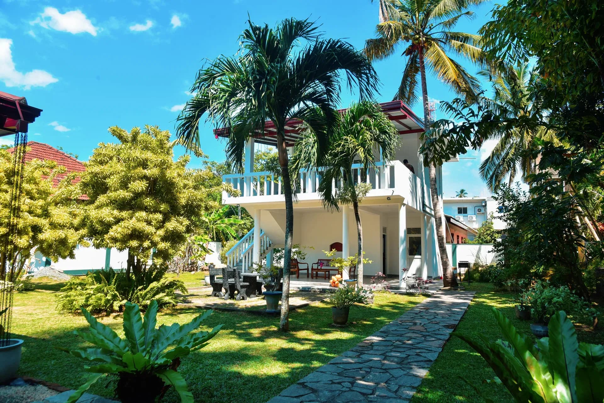 Lush bungalow garden with greenery